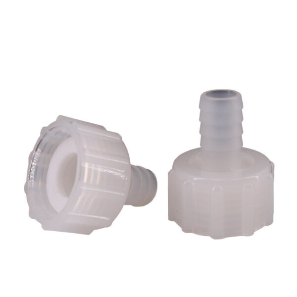 Two white plastic connectors
