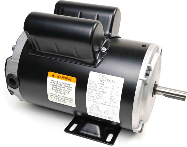 Electric motor with warning label.