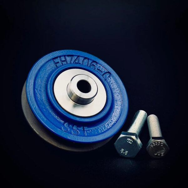 Blue weight plate with bolts nearby