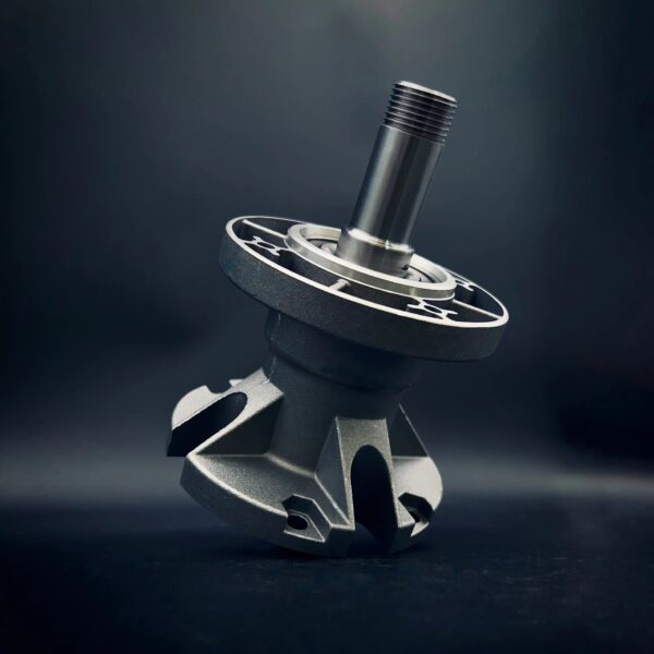 Metal turbine component on dark background