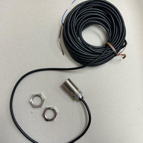 Coiled cable with connectors and nuts