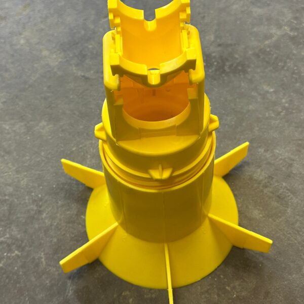 Yellow plastic component with multiple fins