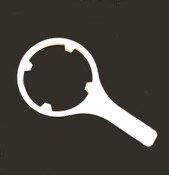 White circular tool with handle