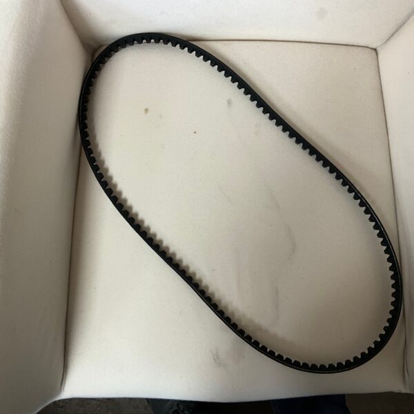 Black rubber belt on white surface