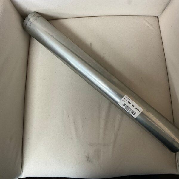 Metal tube resting on soft surface