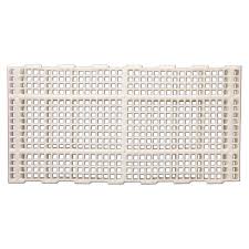 White plastic grid storage mat