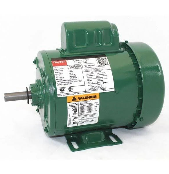Green electric motor with warning label