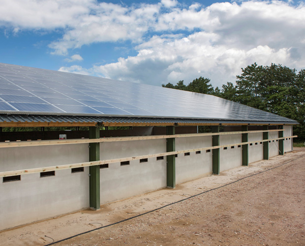 Solar panels installed on building roof.